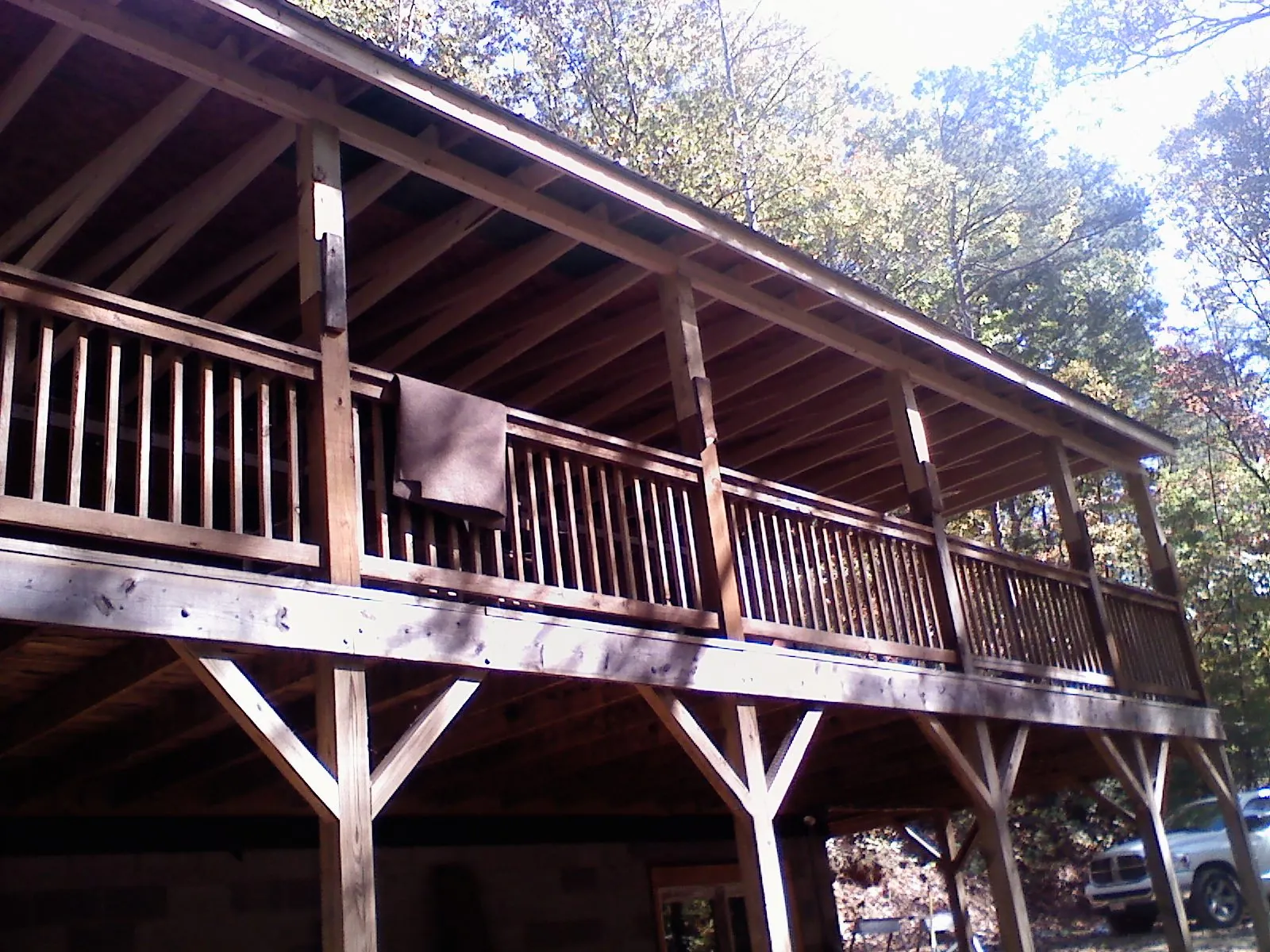 Timber framing under a new elevated porch and deck — Roof Leak Repair in Rockaway Park by Roofing Brothers